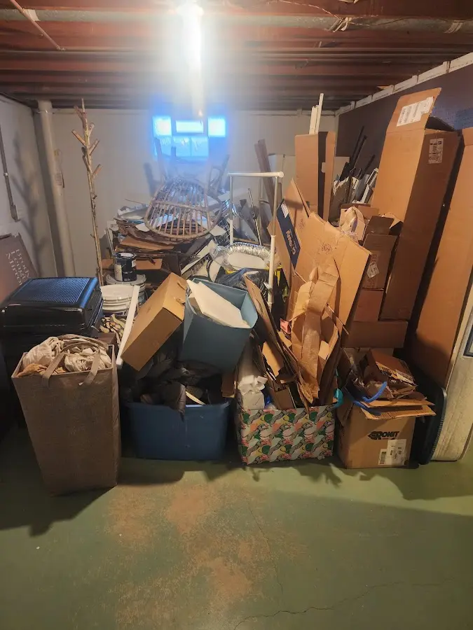 Roll-off dumpster container at job site for Concrete Dumpster Rental in Green Oak